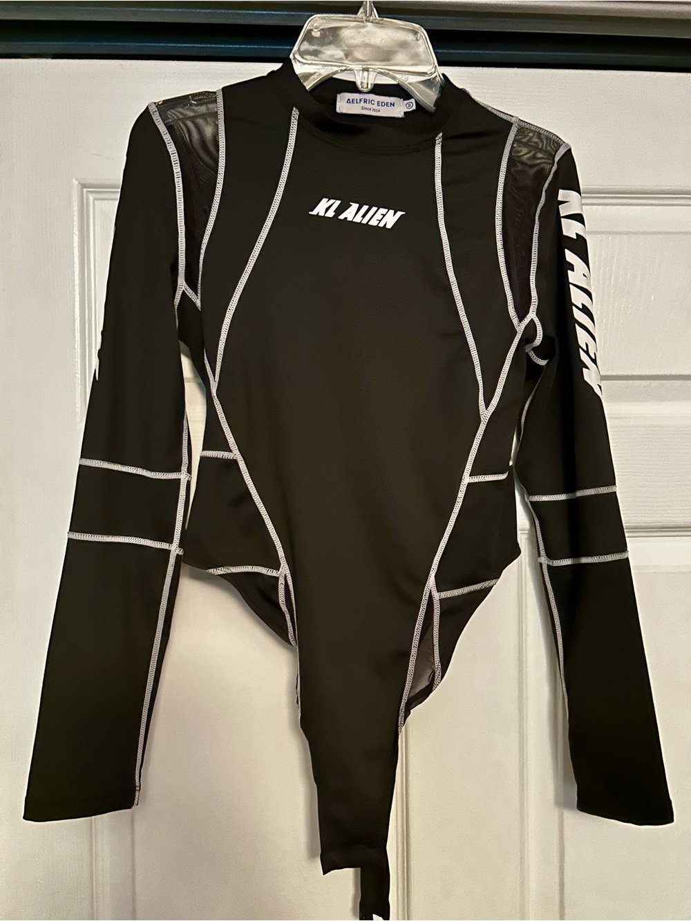 Aelfric Eden Black Long-Sleeve Graphic Top with White Contrast Stitching